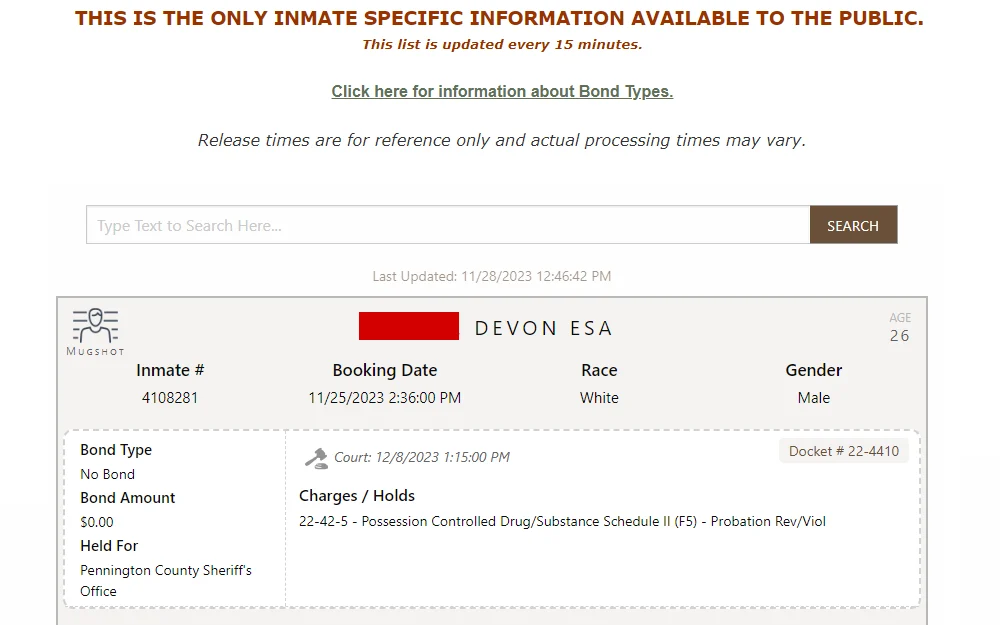 Screenshot displaying an inmate's charge and bond information, along with their name, age, inmate number, booking date and time, race, gender, court date, and docket number.